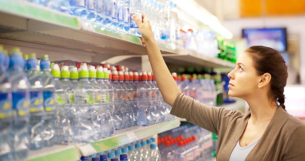 Woman looking at products on a shelf