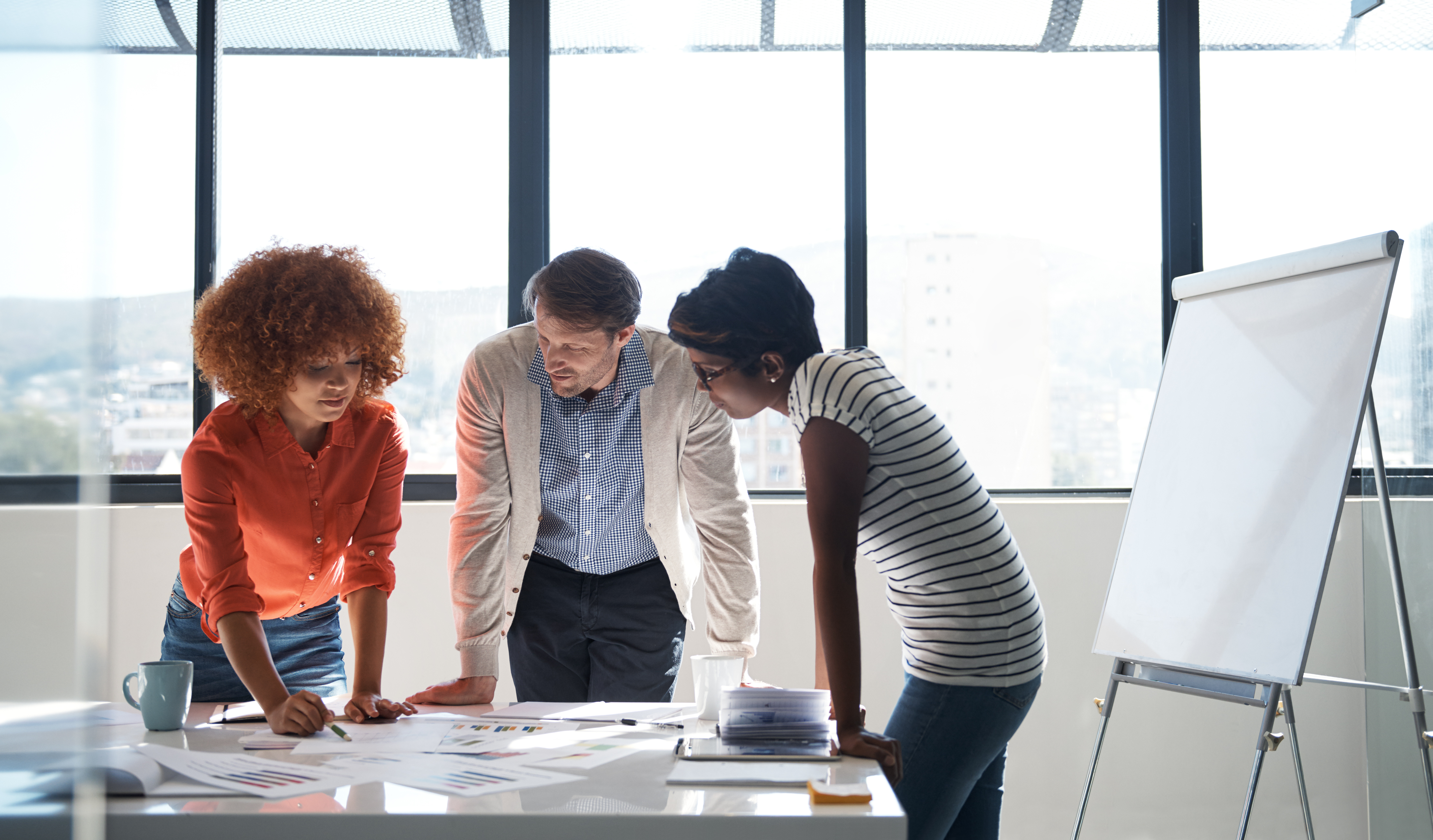 Shot of a group of colleagues having a brainstorming session in the boardroom