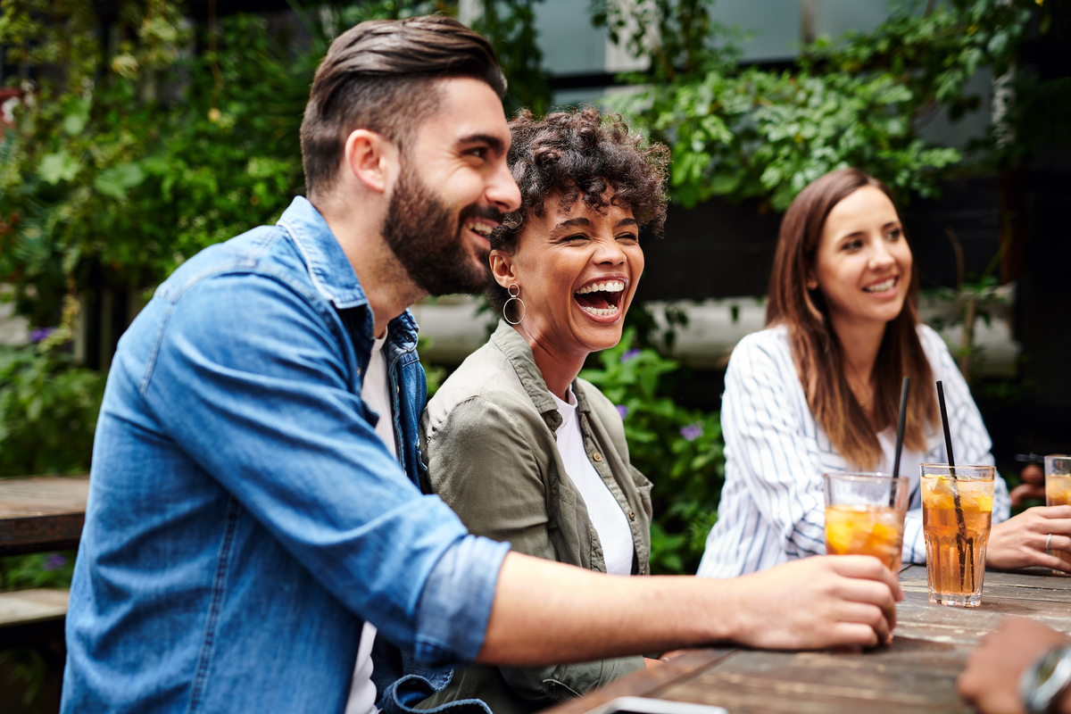 Shot of a group of young friends having drinks at a restaurant