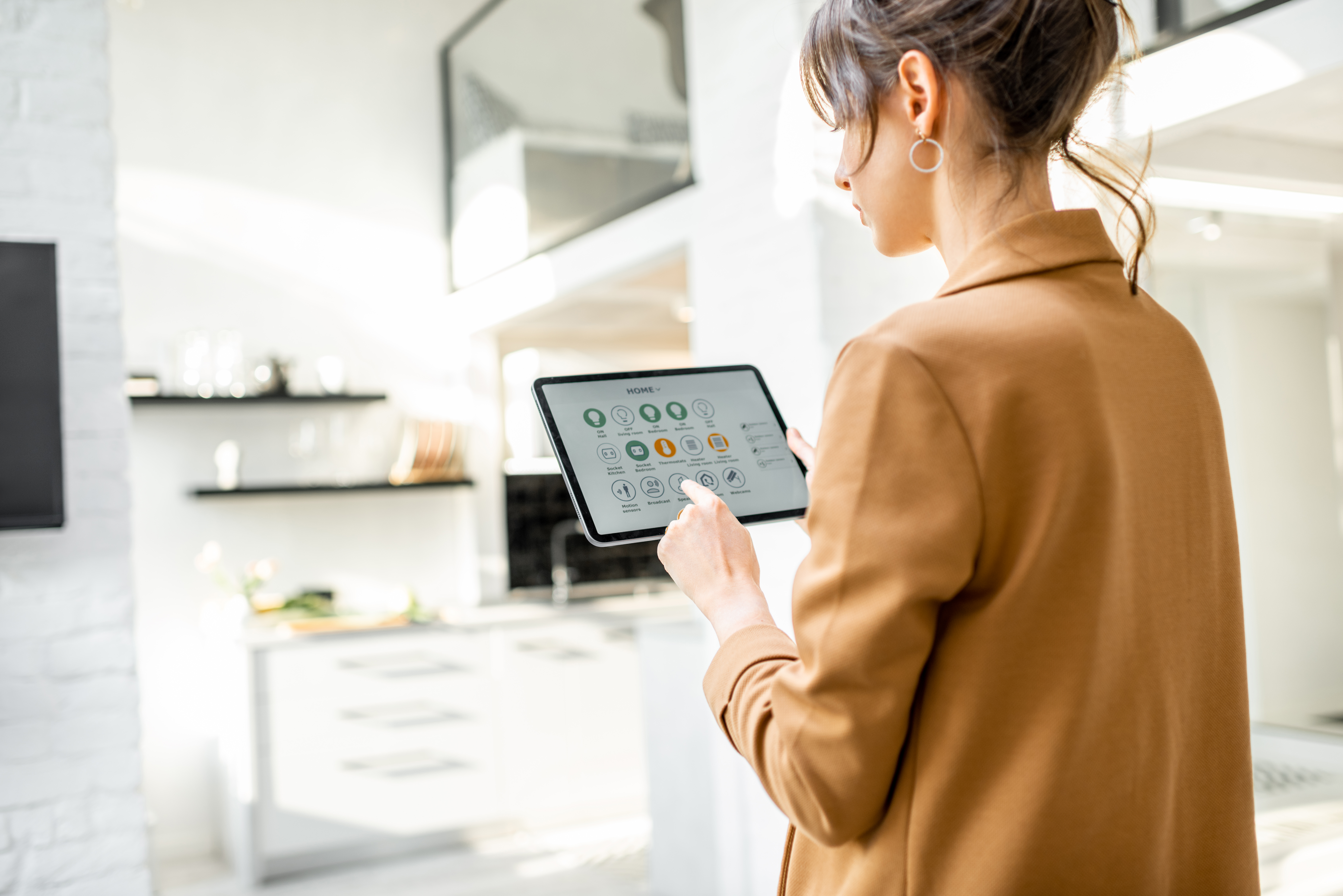 Woman using smart doorbell interface