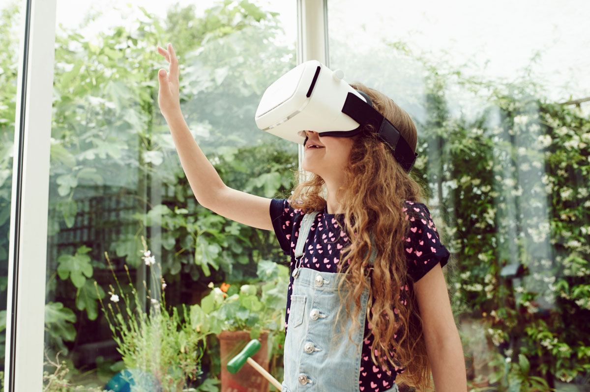 Portrait of child wearing virtual reality headset