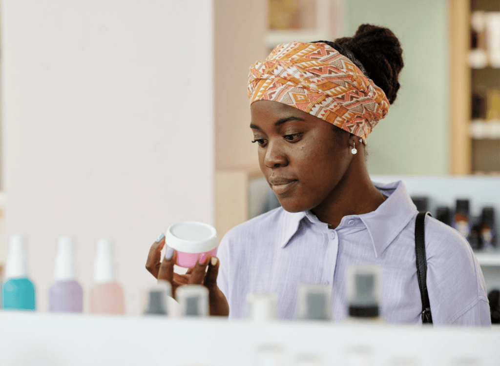 Black girl buying beauty products
